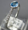 .65CT DIAMOND & AAA BLUE TOPAZ 14KT WHITE GOLD PEAR SHAPE & ROUND BEZEL FUN RING
