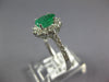 1.41CT DIAMOND & AAA EMERALD 14KT WHITE GOLD OVAL & ROUND FLOWER ENGAGEMENT RING