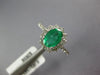 1.41CT DIAMOND & AAA EMERALD 14KT WHITE GOLD OVAL & ROUND FLOWER ENGAGEMENT RING
