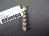 ESTATE .14CT DIAMOND 14KT 2 TONE GOLD CLASSIC 5 STONE JOURNEY BEZEL LOVE PENDANT
