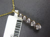 ESTATE .14CT DIAMOND 14KT 2 TONE GOLD CLASSIC 5 STONE JOURNEY BEZEL LOVE PENDANT