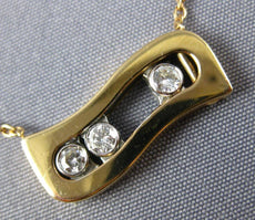 ESTATE .17CT DIAMOND 18KT WHITE & ROSE GOLD 3 STONE ETOILE FLOATING LOVE PENDANT