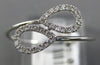 ESTATE .11CT DIAMOND 14KT WHITE GOLD 3D DOUBLE PEAR SHAPE LEAF CRISS CROSS RING