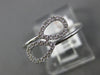 ESTATE .11CT DIAMOND 14KT WHITE GOLD 3D DOUBLE PEAR SHAPE LEAF CRISS CROSS RING