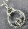 ESTATE .17CT DIAMOND 18KT WHITE GOLD 3D CIRCLE OF LIFE FLOWER FLOATING PENDANT