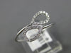 ESTATE .11CT DIAMOND 14KT WHITE GOLD 3D DOUBLE PEAR SHAPE LEAF CRISS CROSS RING