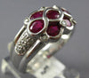 1.88CT DIAMOND & AAA RUBY 14KT WHITE GOLD OVAL & ROUND INFINITY FLOWER LOVE RING