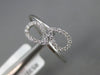 ESTATE .11CT DIAMOND 14KT WHITE GOLD 3D DOUBLE PEAR SHAPE LEAF CRISS CROSS RING