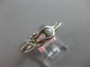 0.03CT DIAMOND 14KT WHITE GOLD CLASSIC SOLITAIRE LOVE KNOT CRISS CROSS FUN RING