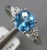ESTATE 1.26CT DIAMOND & AAA BLUE TOPAZ 14KT WHITE GOLD CUSHION & ROUND FUN RING