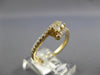 ESTATE .50CT DIAMOND 14KT YELLOW GOLD 3D 2 STONE CRISS CROSS LOVE FUN RING