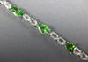 12.43CT AAA WHITE SAPPHIRE & TSAVORITE 18KT WHITE GOLD MULTI SHAPE FUN BRACELET