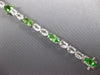 12.43CT AAA WHITE SAPPHIRE & TSAVORITE 18KT WHITE GOLD MULTI SHAPE FUN BRACELET