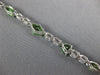 12.43CT AAA WHITE SAPPHIRE & TSAVORITE 18KT WHITE GOLD MULTI SHAPE FUN BRACELET