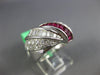 2.70CT DIAMOND & AAA RUBY 18KT WHITE GOLD ROUND & BAGUETTE CRISS CROSS LOVE RING