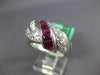 2.70CT DIAMOND & AAA RUBY 18KT WHITE GOLD ROUND & BAGUETTE CRISS CROSS LOVE RING