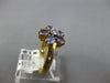 .84CT DIAMOND & AAA TANZANITE 14KT YELLOW GOLD 3D OVAL AND ROUND FLOWER FUN RING