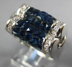 6.0CT DIAMOND & AAA SAPPHIRE 18KT WHITE GOLD ROUND & PRINCESS INVISIBLE FUN RING