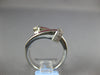 3.62CT DIAMOND & AAA RUBY 18KT WHITE GOLD ROUND & PRINCESS CRISS CROSS FUN RING