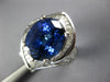 LARGE 9.52CT DIAMOND & TANZANITE 18KT WHITE GOLD OVAL & BAGUETTE ENGAGEMENT RING