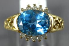 2.74CT DIAMOND & AAA BLUE TOPAZ 14KT YELLOW GOLD OVAL & ROUND FILIGREE FUN RING