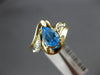 1.30CT DIAMOND & AAA BLUE TOPAZ 14KT YELLOW GOLD 3D PEAR SHAPE & ROUND FUN RING
