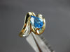 1.30CT DIAMOND & AAA BLUE TOPAZ 14KT YELLOW GOLD 3D PEAR SHAPE & ROUND FUN RING