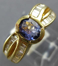 1.78CT DIAMOND & AAA TANZANITE 14KT YELLOW GOLD OVAL & BAGUETTE ENGAGEMENT RING
