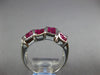 4.02CT DIAMOND & AAA RUBY 18KT WHITE GOLD ROUND & PRINCESS CRISS CROSS FUN RING