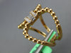 ESTATE LARGE .11CT DIAMOND 18KT ROSE GOLD 3D ROUND & BAGUETTE LOVE KNOT RING