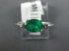 .70CT DIAMOND & AAA EMERALD 14KT WHITE GOLD OVAL & ROUND 3 STONE FRIENDSHIP RING
