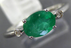 .70CT DIAMOND & AAA EMERALD 14KT WHITE GOLD OVAL & ROUND 3 STONE FRIENDSHIP RING