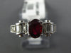 1.49CT DIAMOND & AAA RUBY 18KT WHITE GOLD ROUND & BAGUETTE OVAL ENGAGEMENT RING