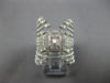 EXTRA LARGE .96CT DIAMOND 14KT WHITE GOLD ROUND & BAGUETTE LEAF ANNIVERSARY RING