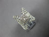 EXTRA LARGE .96CT DIAMOND 14KT WHITE GOLD ROUND & BAGUETTE LEAF ANNIVERSARY RING
