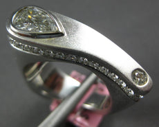 1.42CT DIAMOND 18KT WHITE GOLD PEAR SHAPE & ROUND MATTE & SHINY ETOILE FUN RING