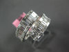 WIDE 1.53CT DIAMOND 18KT WHITE GOLD ROUND & BAGUETTE INVISIBLE CRISS CROSS RING