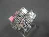 WIDE 1.53CT DIAMOND 18KT WHITE GOLD ROUND & BAGUETTE INVISIBLE CRISS CROSS RING