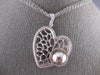 EXTRA LARGE .95CT DIAMOND 18KT 2 TONE GOLD FILIGREE SIDEWAY HEART GLOBE PENDANT