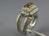 3.23CT WHITE & FANCY ORANGE BROWN DIAMOND PLATINUM EMERALD CUT ENGAGEMENT RING