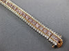 WIDE & LONG 12.26CT WHITE & PINK DIAMOND 18KT WHITE & ROSE GOLD TENNIS BRACELET
