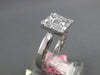 .57CT DIAMOND 18KT WHITE GOLD ROUND & BAGUETTE INVISIBLE MULTI HEART LOVE RING
