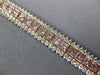 WIDE & LONG 12.26CT WHITE & PINK DIAMOND 18KT WHITE & ROSE GOLD TENNIS BRACELET