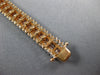 WIDE & LONG 12.26CT WHITE & PINK DIAMOND 18KT WHITE & ROSE GOLD TENNIS BRACELET