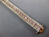 WIDE & LONG 12.26CT WHITE & PINK DIAMOND 18KT WHITE & ROSE GOLD TENNIS BRACELET
