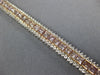 WIDE & LONG 12.26CT WHITE & PINK DIAMOND 18KT WHITE & ROSE GOLD TENNIS BRACELET