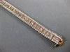 WIDE & LONG 12.26CT WHITE & PINK DIAMOND 18KT WHITE & ROSE GOLD TENNIS BRACELET