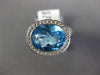3.76CT DIAMOND & AAA BLUE TOPAZ 18KT WHITE GOLD OVAL & ROUND BEZEL FUN LOVE RING