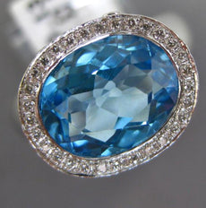 3.76CT DIAMOND & AAA BLUE TOPAZ 18KT WHITE GOLD OVAL & ROUND BEZEL FUN LOVE RING