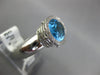 3.76CT DIAMOND & AAA BLUE TOPAZ 18KT WHITE GOLD OVAL & ROUND BEZEL FUN LOVE RING